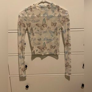 Mesh butterfly top, fits like an XS